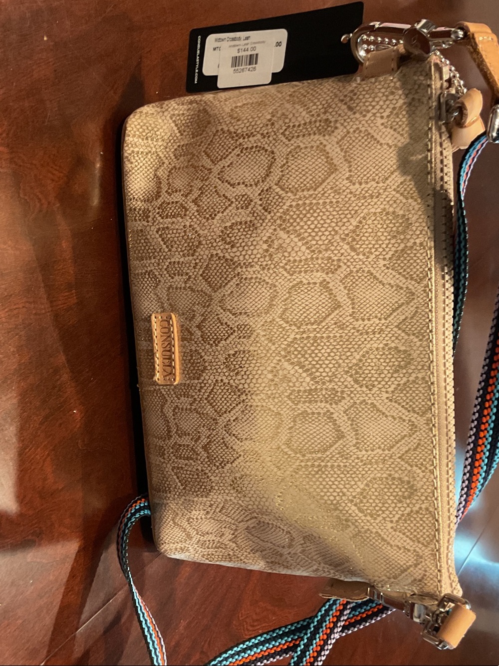 Consuela midtown gold snake print crossbody